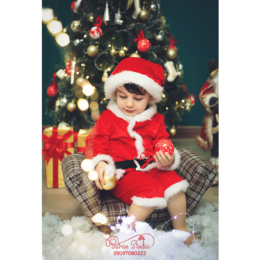عکاسی کودک با تم کریسمس